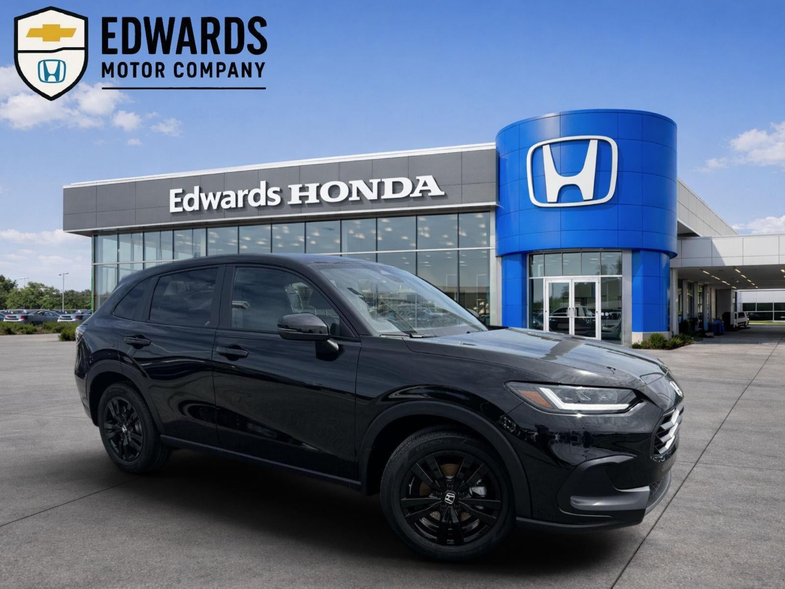 2027 Honda HR-V Sport in Nh-731P And Crystal Bl — front three-quarter view