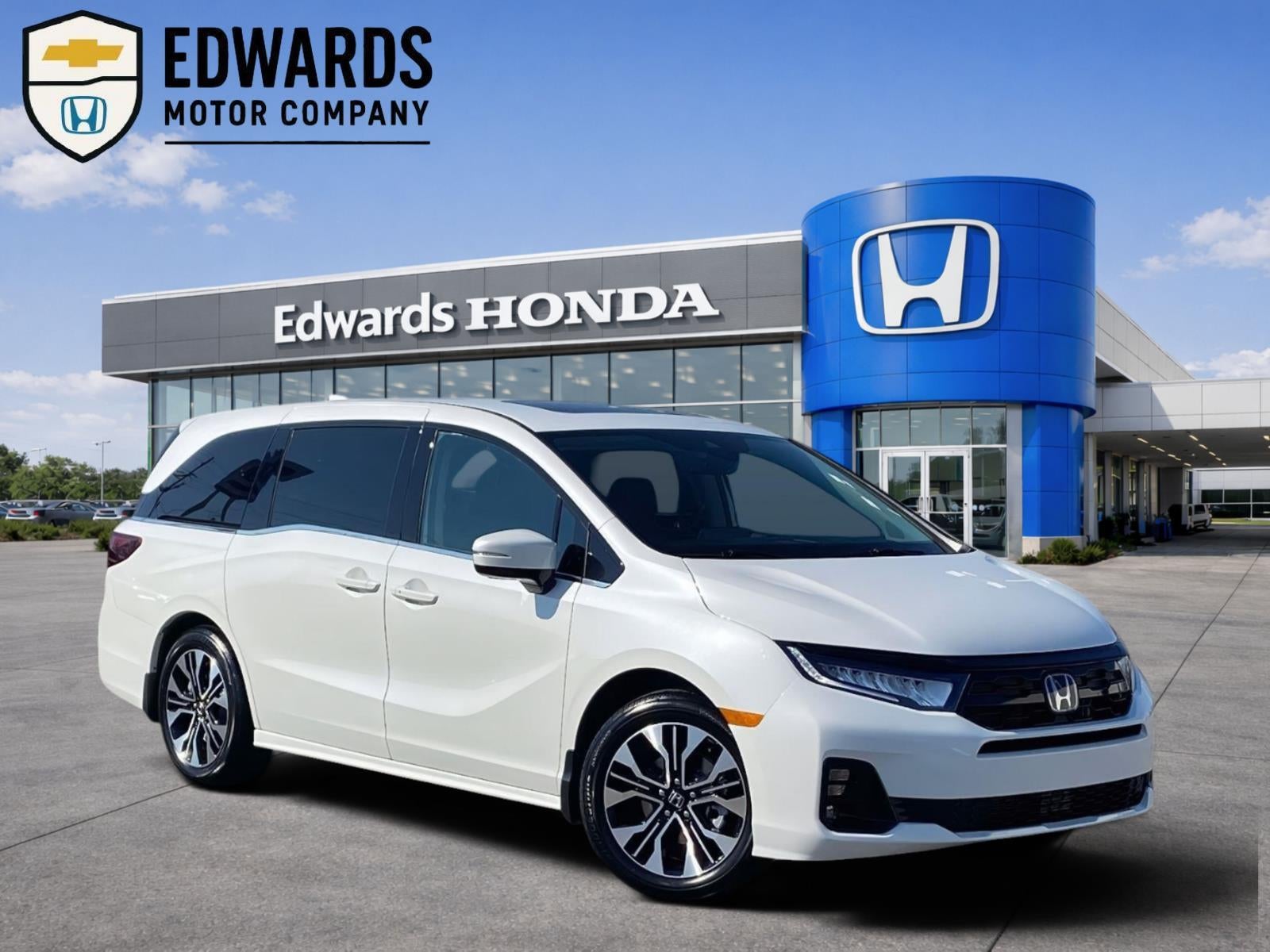 2026 Honda Odyssey Elite in Nh-883P And Platinum W — front three-quarter view